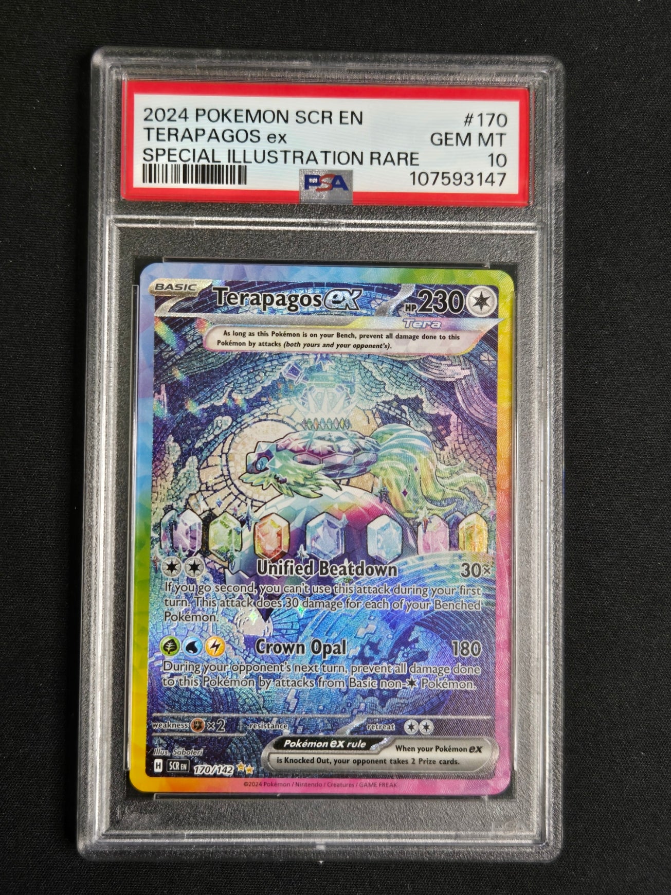 A graded Pokémon TCG card, Terapagos ex from the 2024 Scarlet & Violet set, sealed in a PSA Gem Mint 10 protective slab against a black background.