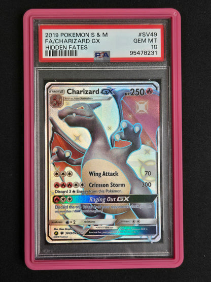 A graded 2019 Pokémon S & M Hidden Fates GX Charizard GX card, PSA graded GEM MT 10, sealed in a pink protective slab against a black background.