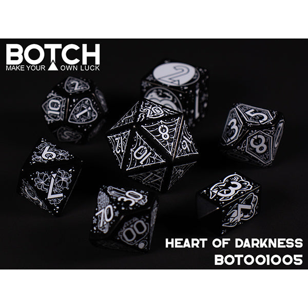 Set of black and white dice with intricate designs on a dark background, featuring the brand 'BOTCH'.