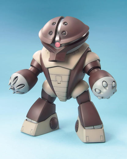 A small articulated robot toy figure with a brown and beige body, gray hands, and a pink nose, standing against a light blue gradient background.