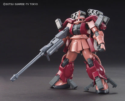 Model kit of a red and black robot with a large weapon on a dark background