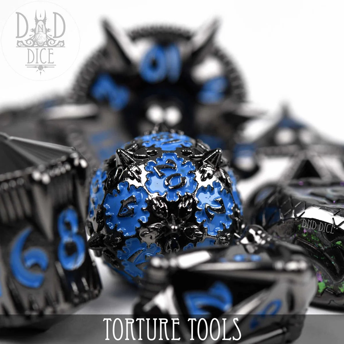 torture tools blue dice set close up
