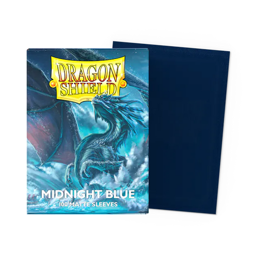 Dragon Shield midnight blue card sleeves with a dragon illustration on the packaging.